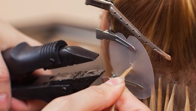 The,Hairdresser,Does,Hair,Extensions,To,A,Young,Girl,,A
